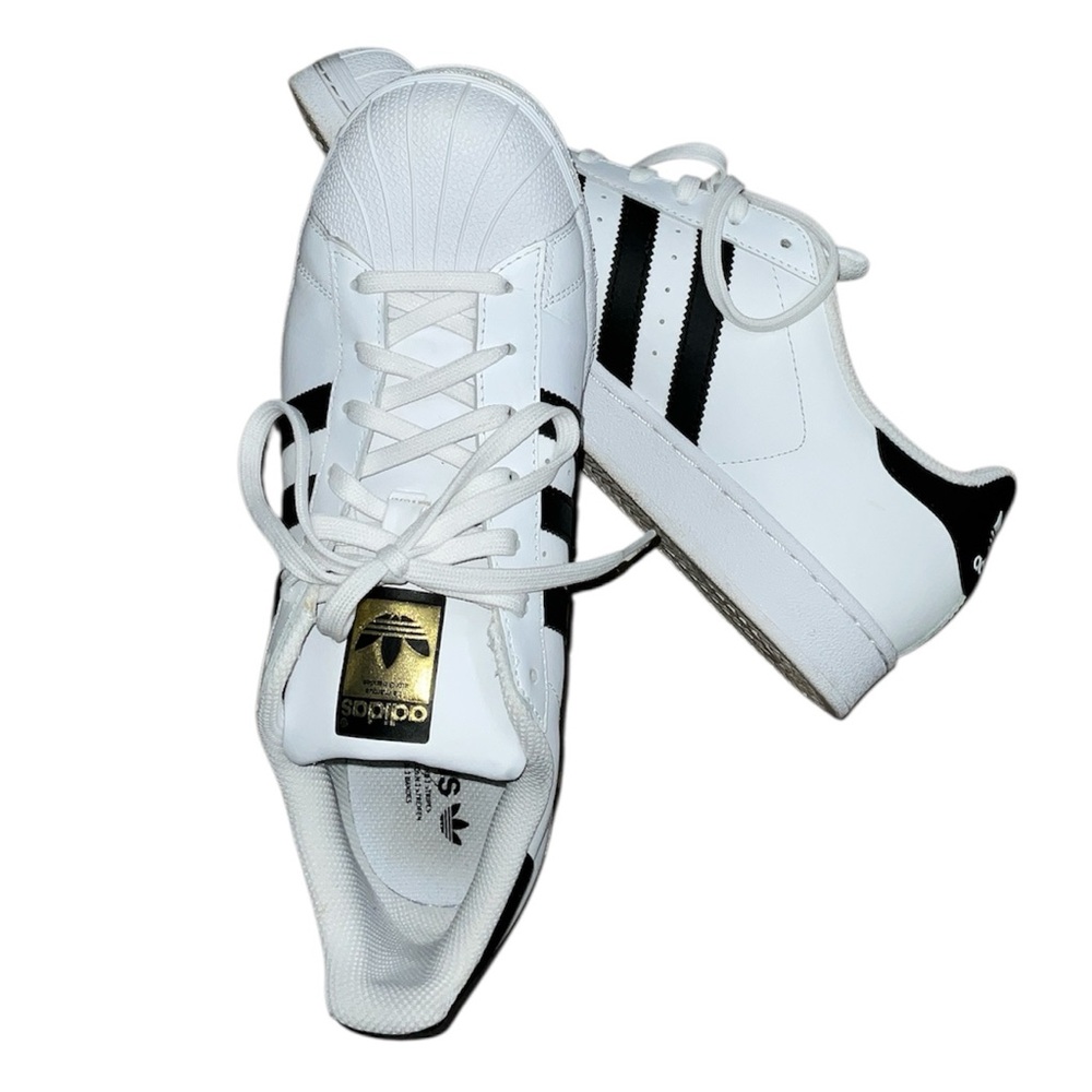 Adidas Classic White and Black Sneakers with Gold Accent